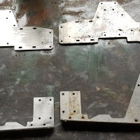 graupner helimax 40   side plates   one cleaned one not cleaned